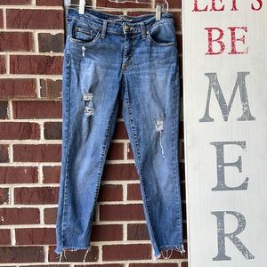 Universal thread mid rise  skinny jeans with distressing.